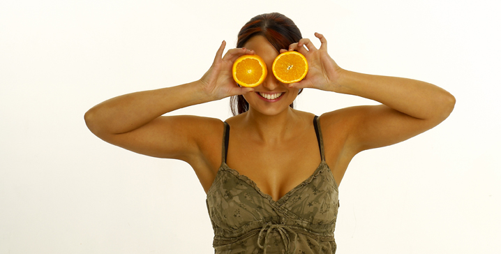 Woman with orange slices
